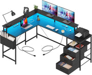 View 3 Drawers L Shaped Desk 63 Inch, 2 Power Strips (6 AC) and LED, Large Gaming Desk & 2 Monitor Stands, L Shape Computer Desk, Stable and Sturdy Home Office Desk, Fabric Drawers, Black image 1