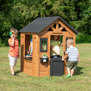 View Children's playhouse cabin, equipped with a game kitchen, snack bar, half-door, toy phone, windows, flower pot stand and an operable doorbell, suitable for creative outdoor games. image 3