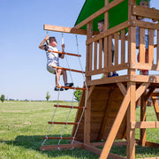 View A complete set of wooden mountain-style swings, equipped with a colorful canvas sunshade, a wave slide, a rope swing, a net swing, and a rock wall with climbing ropes and ladders. image 2