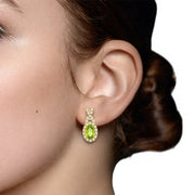 View Oval Shaped Peridot and Diamond Earrings (0.30 ctw) image 3